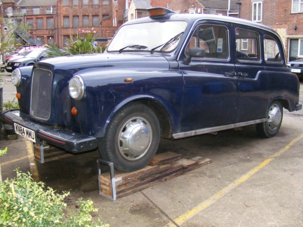 London taxi on home made wooden car ramps
